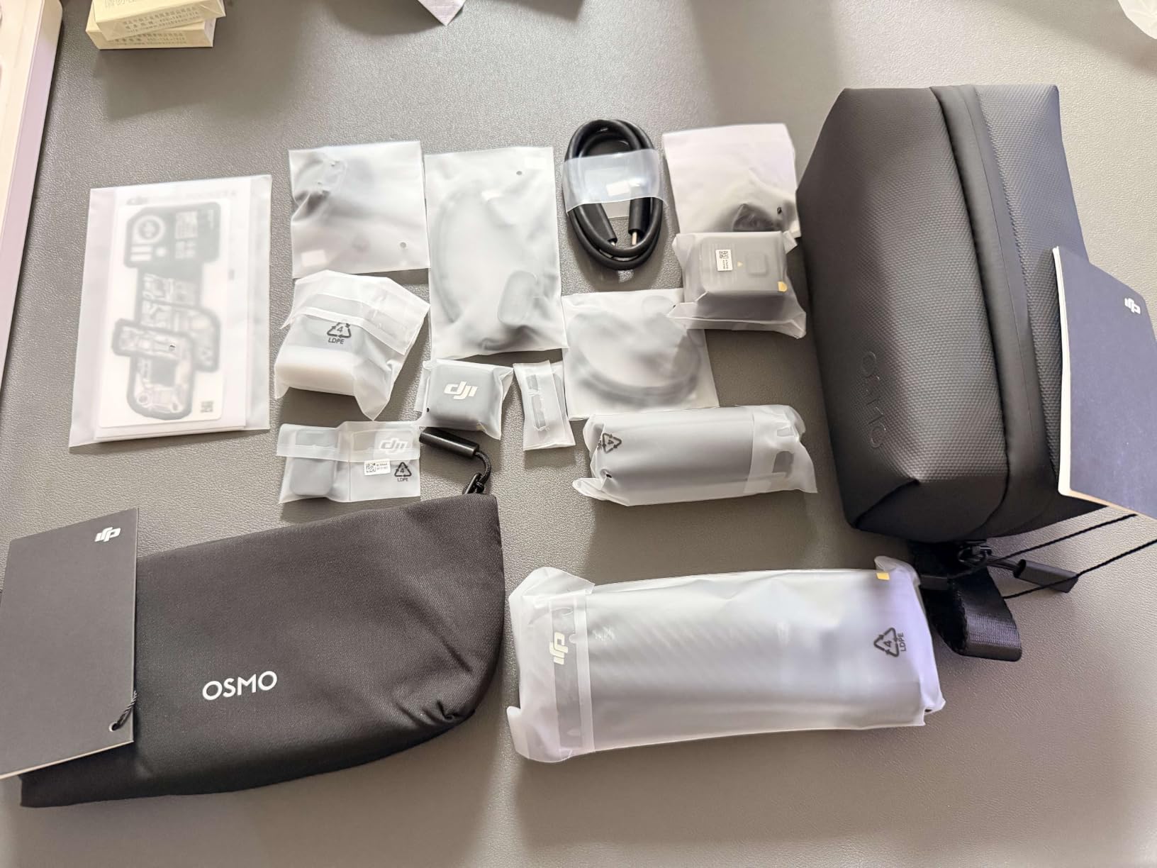 DJI Osmo Pocket 4 Creator Combo, Pocket Gimbal Vlog Camera customer photo 1