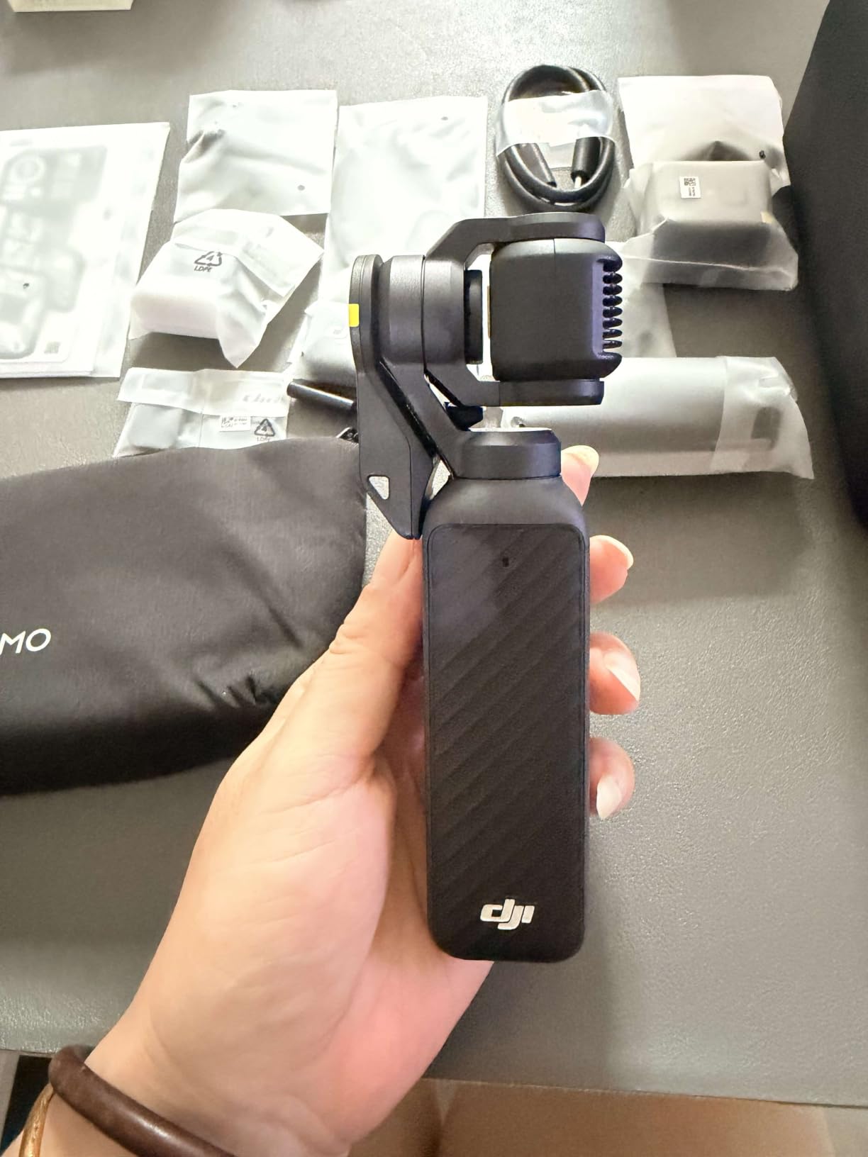 DJI Osmo Pocket 4 Creator Combo, Pocket Gimbal Vlog Camera customer photo 2